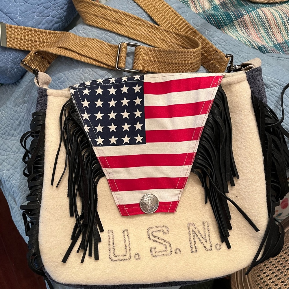 Crossbody bag. Made from a vintage Navy blanket, leather fringe, lined.